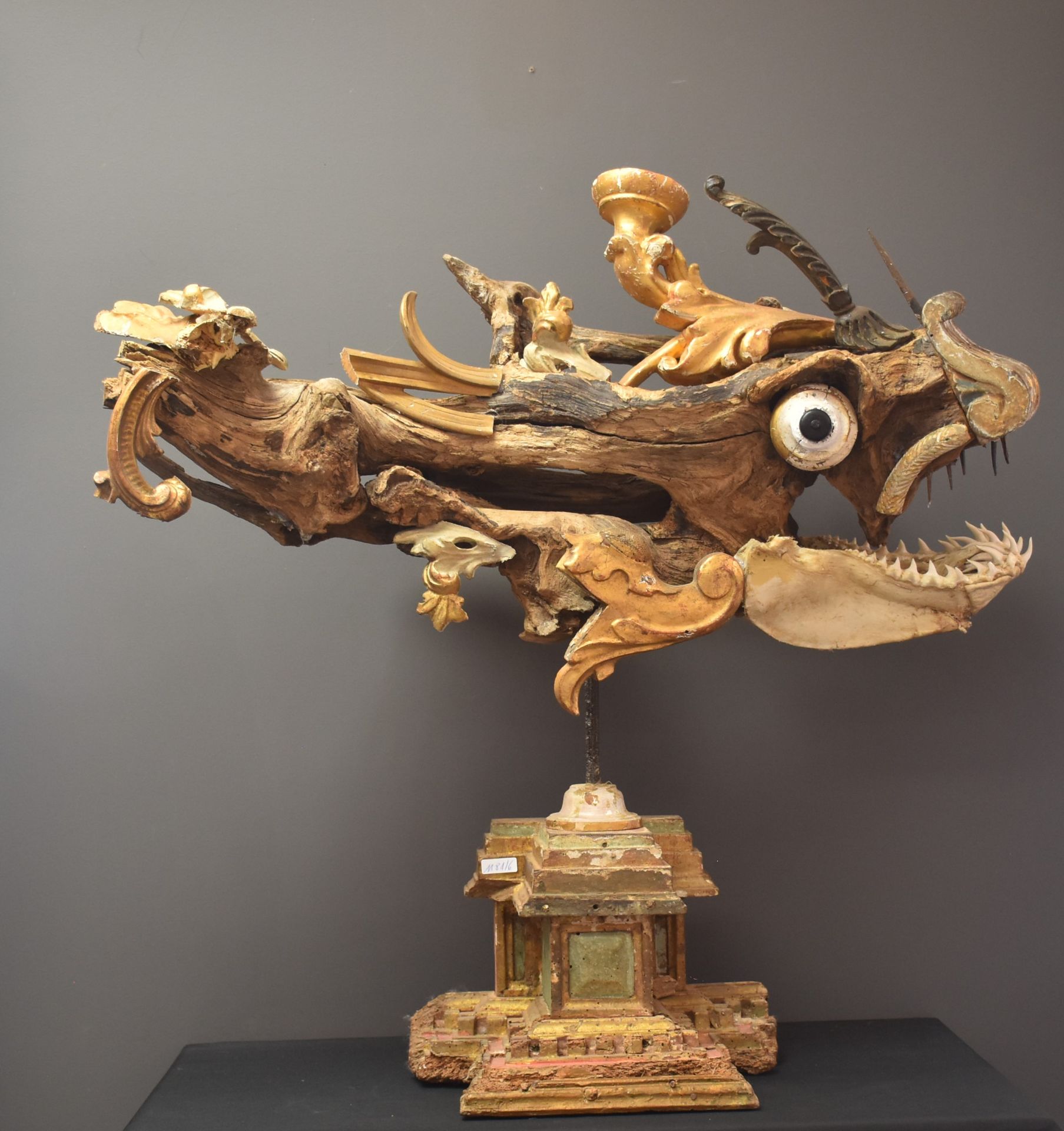 Sea dragon. Composition XXth century made of carved, gilded and patinated wood elements of the XVIII