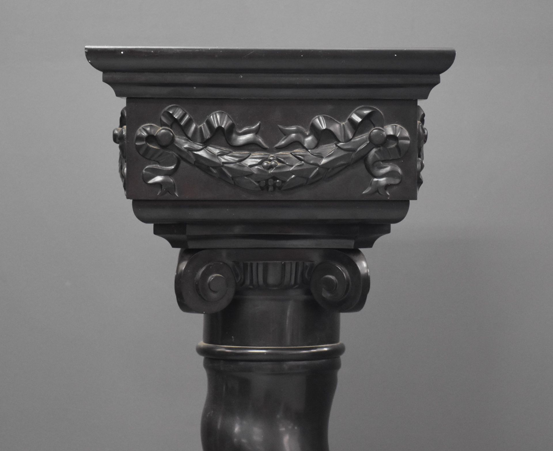 A black twisted marble column, carved with a capital and garlands. Napoleon III period. - Image 2 of 5