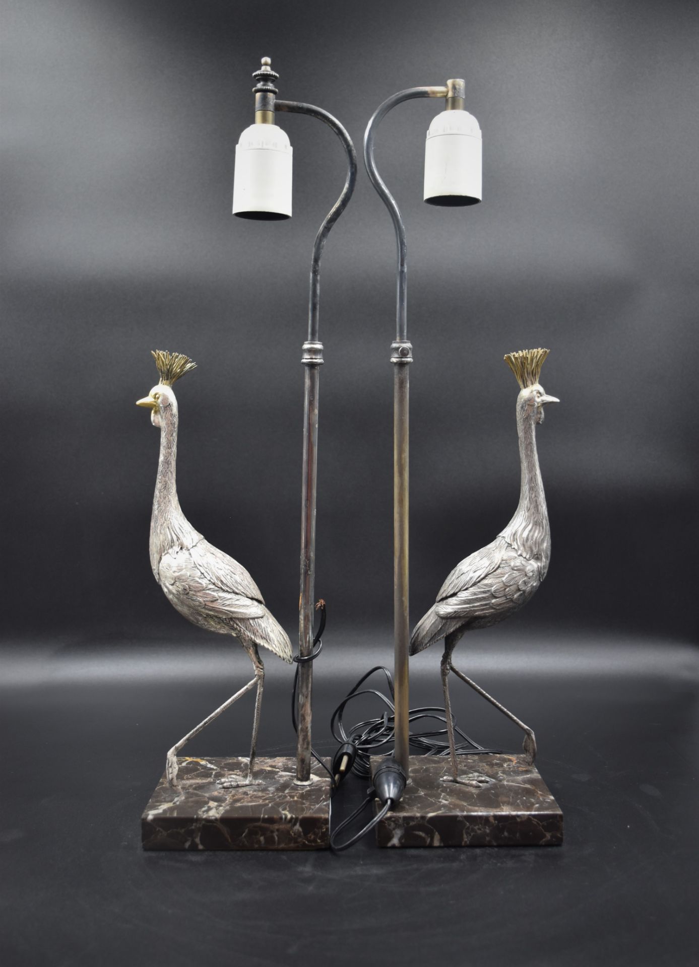 Pair of lamps about 1950 with decorations of stilt walkers out of silver plated metal. Height : 52 c