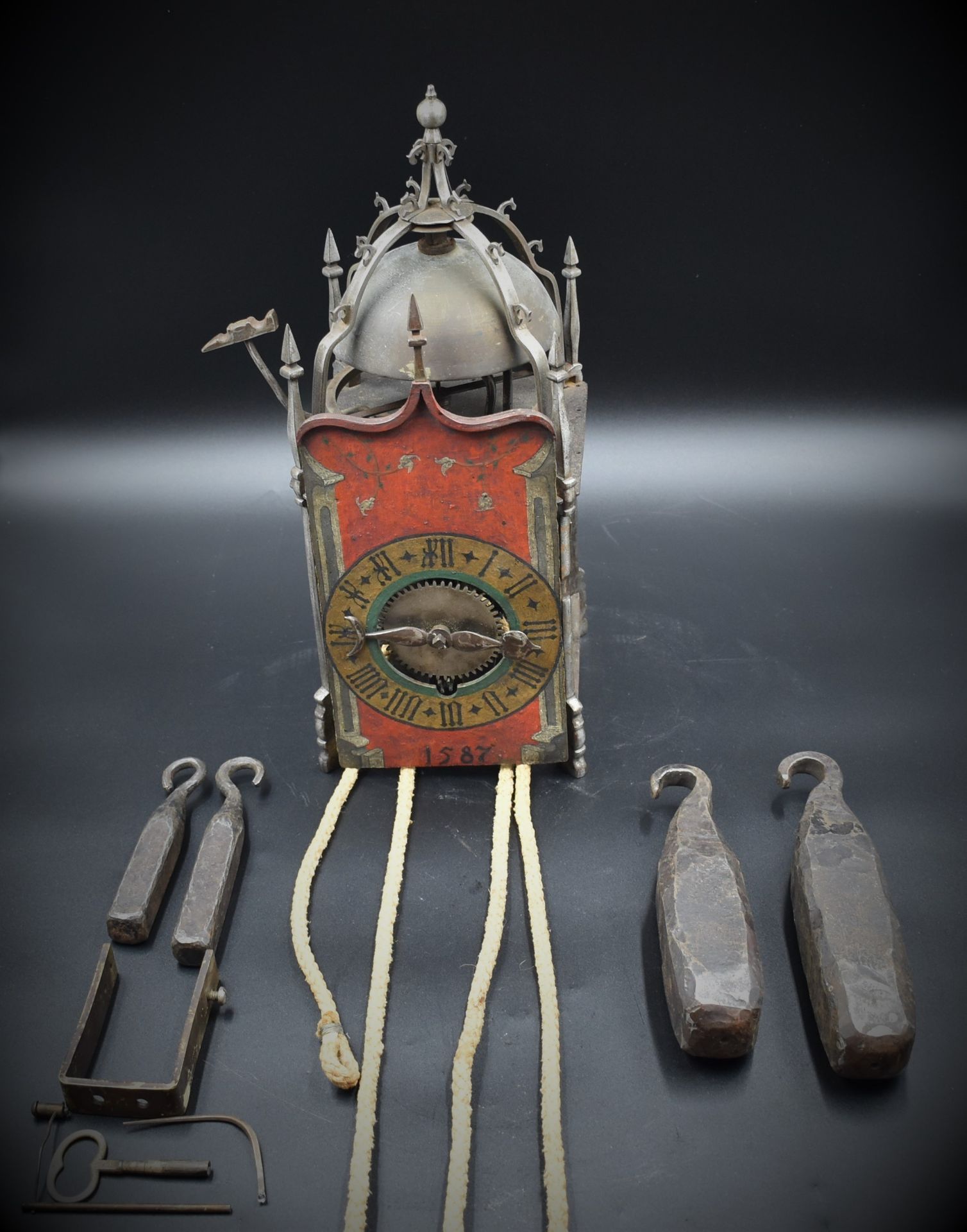 Iron lantern clock with painted dial and dated 1587 Switzerland, Winterthur. Attributed to Earhart