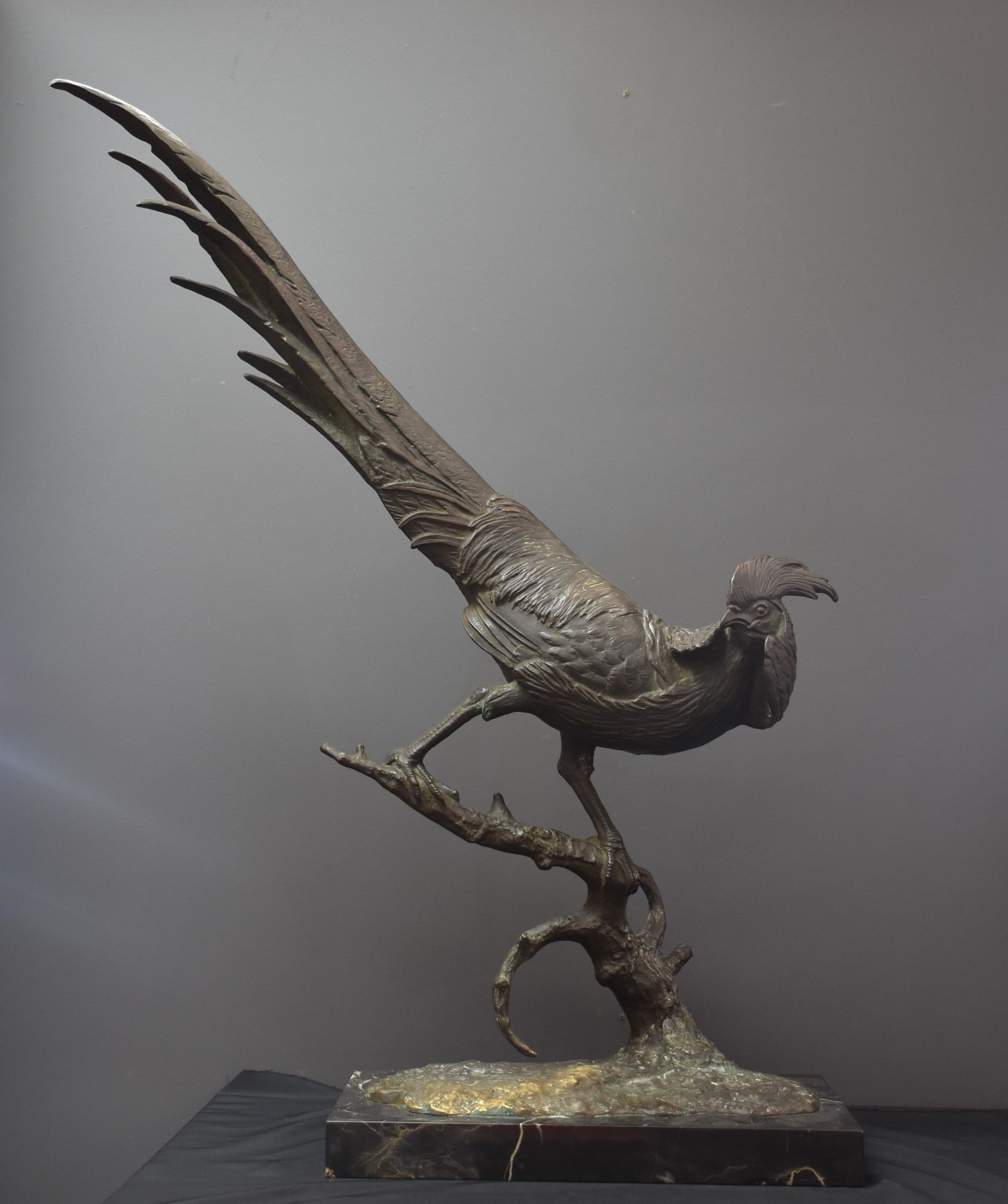 Anton BUSCHELBERGER (1869-1934) Hunting bronze, pheasant balanced on a branch. Height: 72,5 cm.