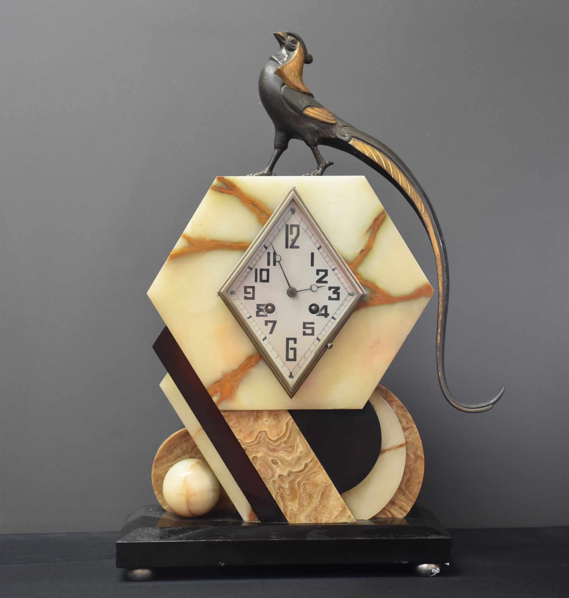 Maurice FRÉCOURT (1890-1961) Art deco clock with a peacock. Bronze, onyx and marble circa 1930 No