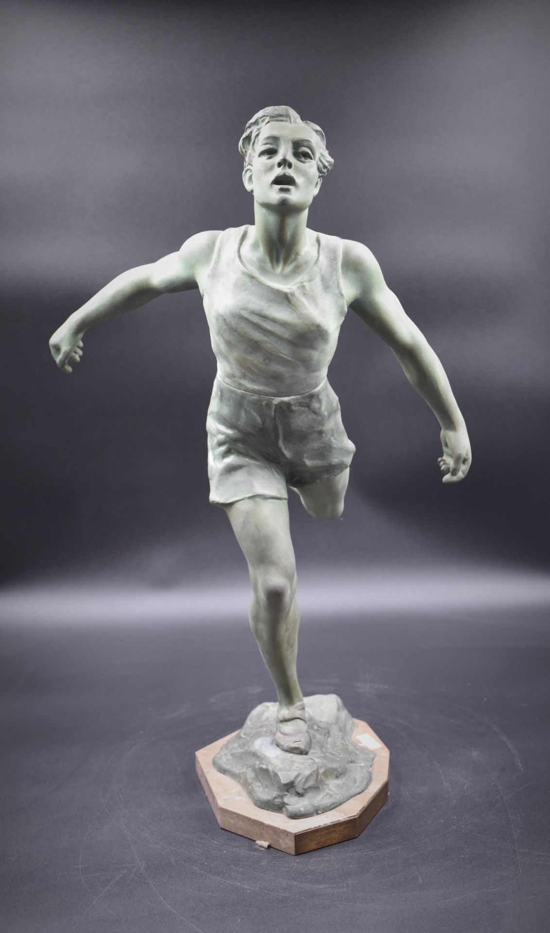 Sculpture in regula representing an athlete in race. Work around 1930 signed Lemoyne. A