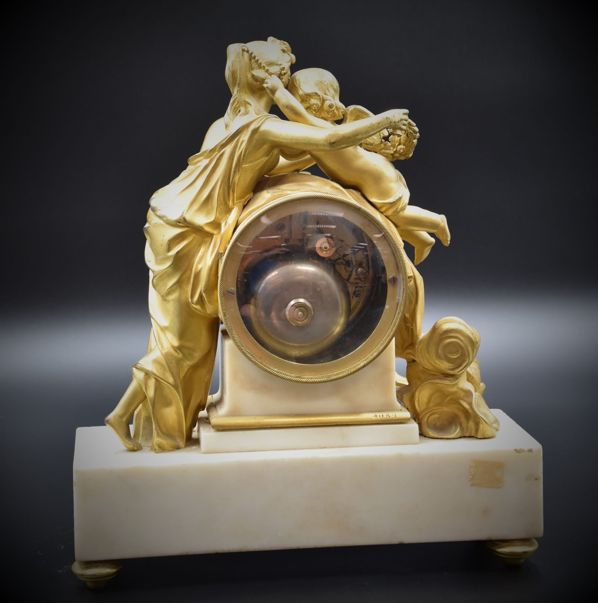 Louis XVI style clock in white marble and gilt bronze. Dial signed Raingo Frères. Height : 33 cm. ( - Image 4 of 4