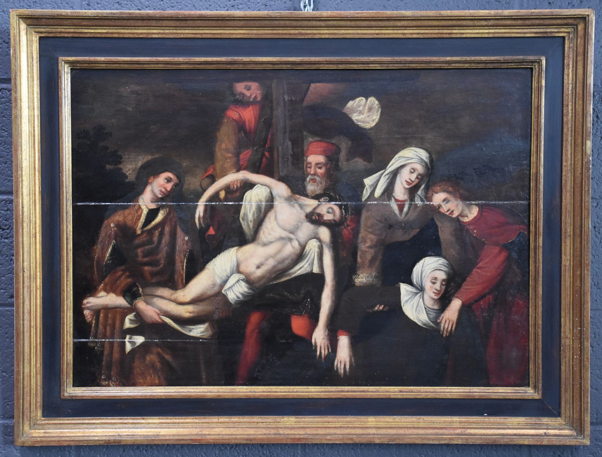 The descent from the cross. Antwerp school, 17th century. Oil on panel. Horizontal cracks.