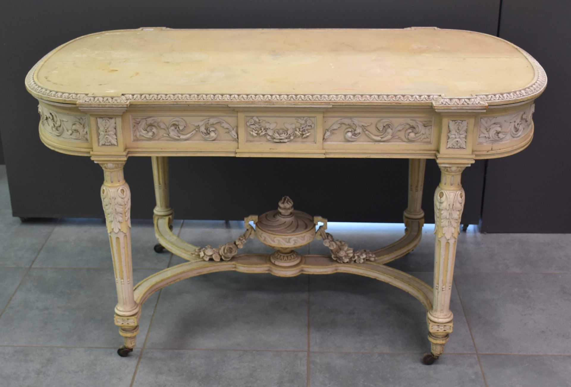 Napoleon III table in patinated wood opening on a drawer in belt. Louis XVI style. Height : 75 cm.