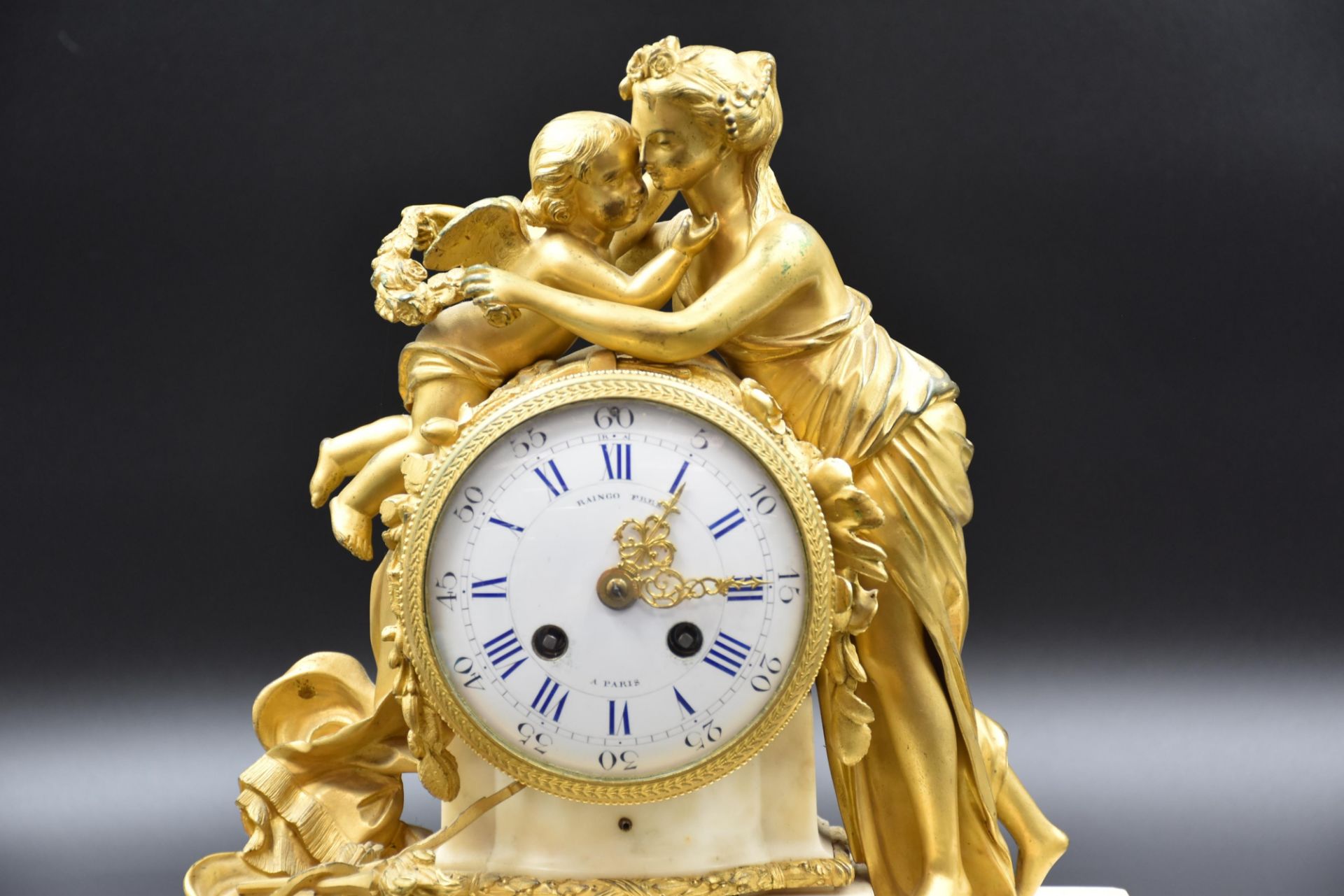 Louis XVI style clock in white marble and gilt bronze. Dial signed Raingo Frères. Height : 33 cm. ( - Image 2 of 4