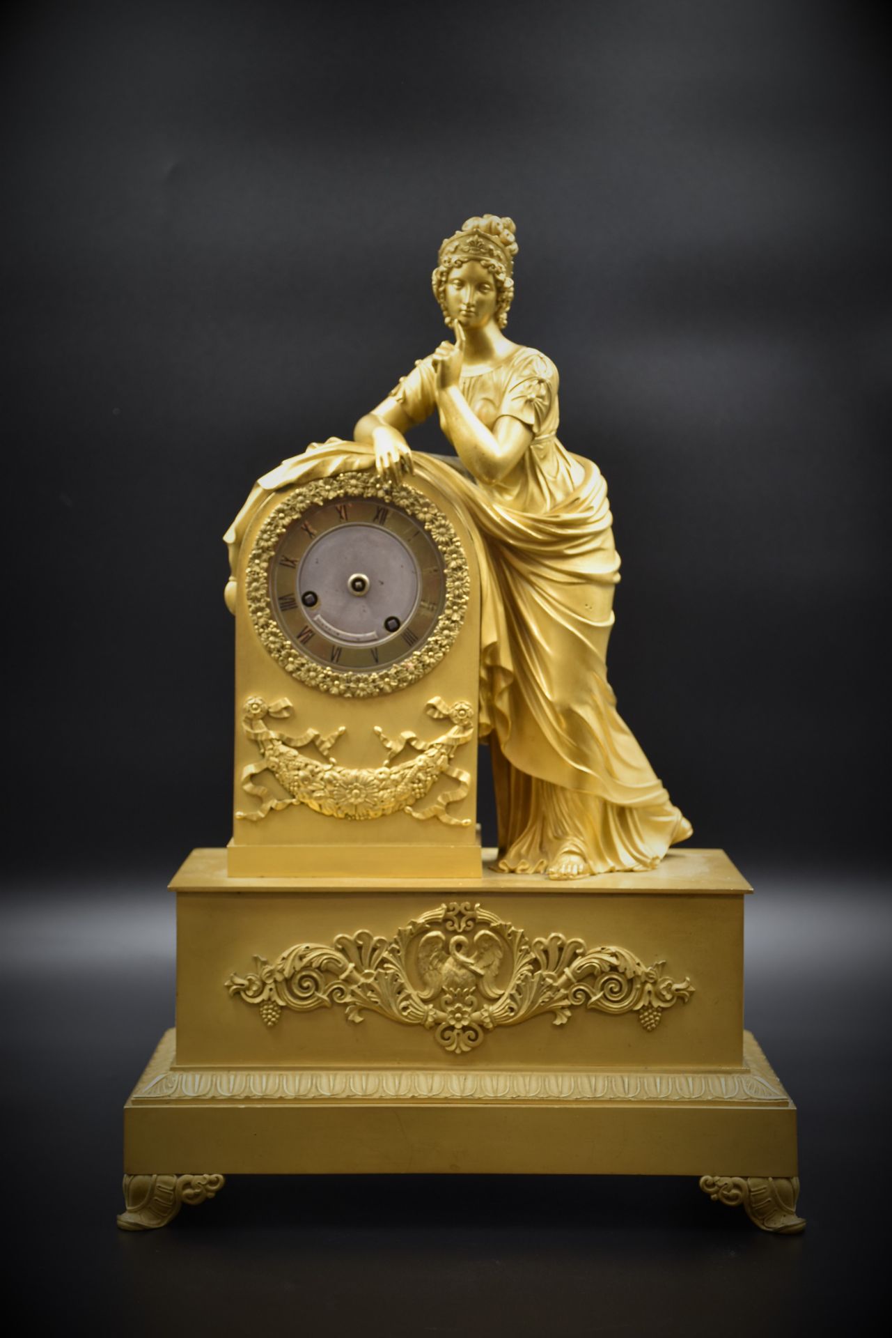 Gilt bronze clock with antique subject. Restoration period. Missing the hands. (No key or