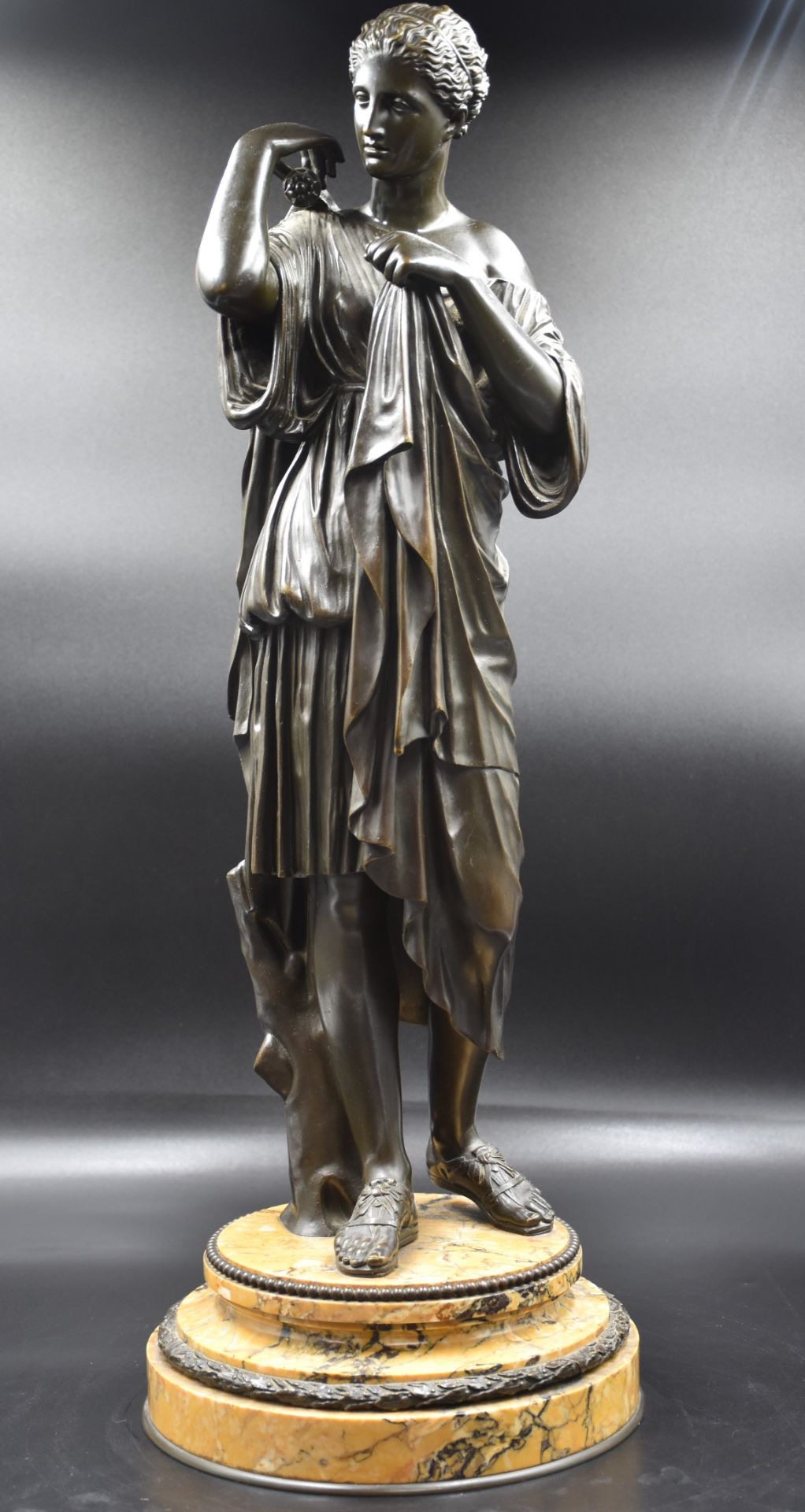 The diane of Gabies. Bronze with brown patina on a Sienna marble base. France end of the XIXth