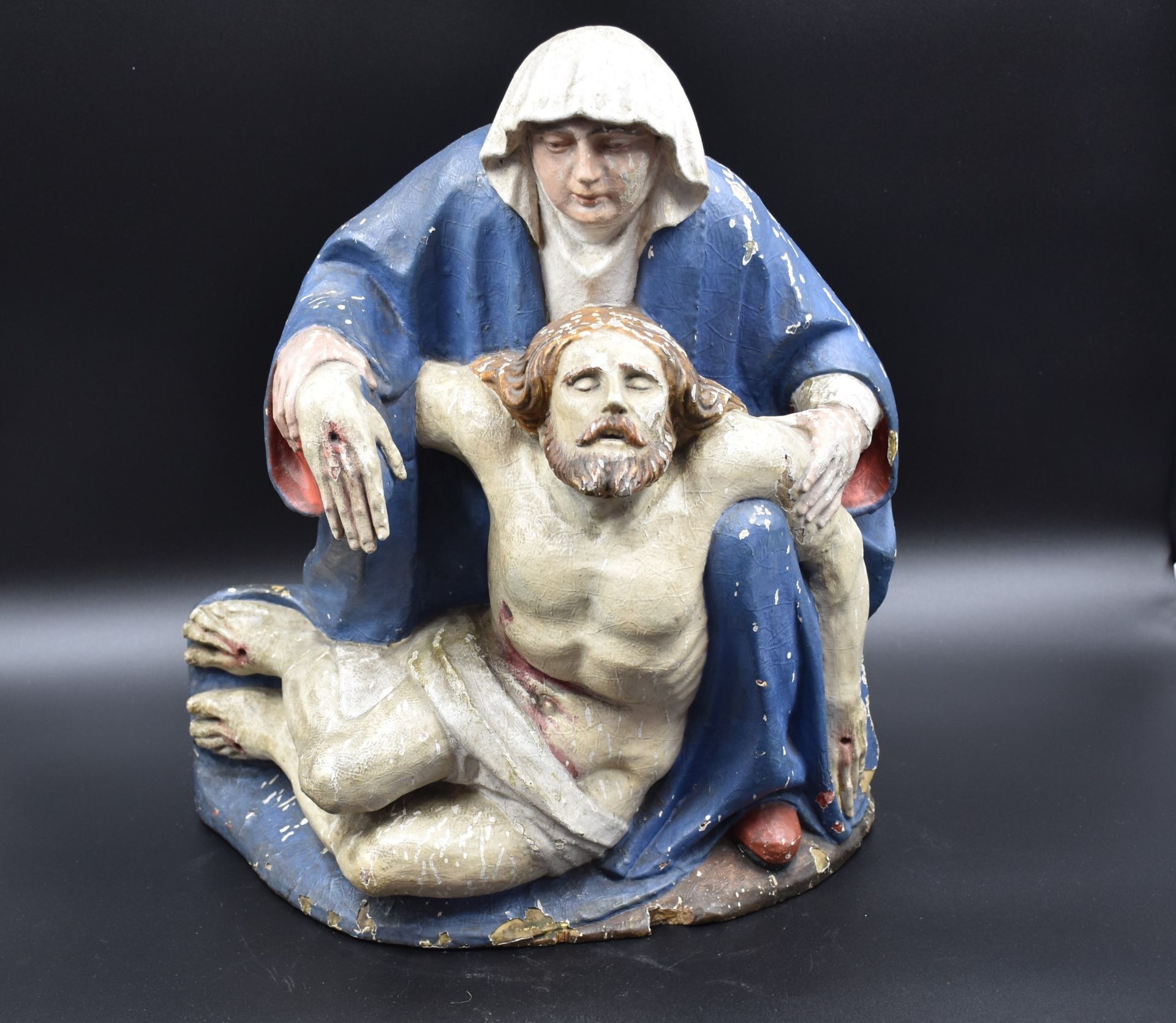 Carved wooden Pieta around 1600. Later polychromy, traces of the original layer. Height: 41 cm.