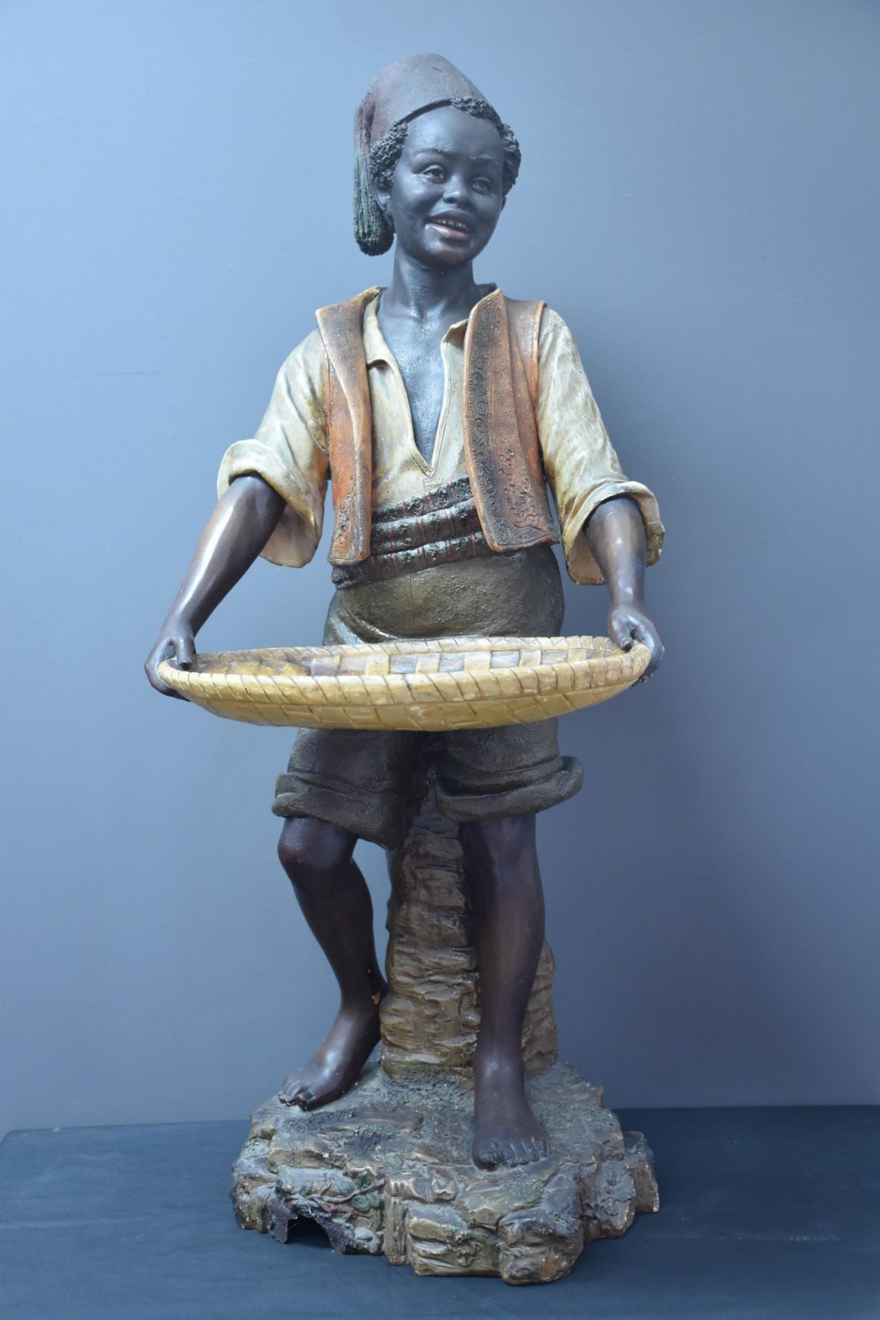 Bernard BLOCH (1836-1909). Polychrome terracotta: The young African with a tray. Height : 84 cm.