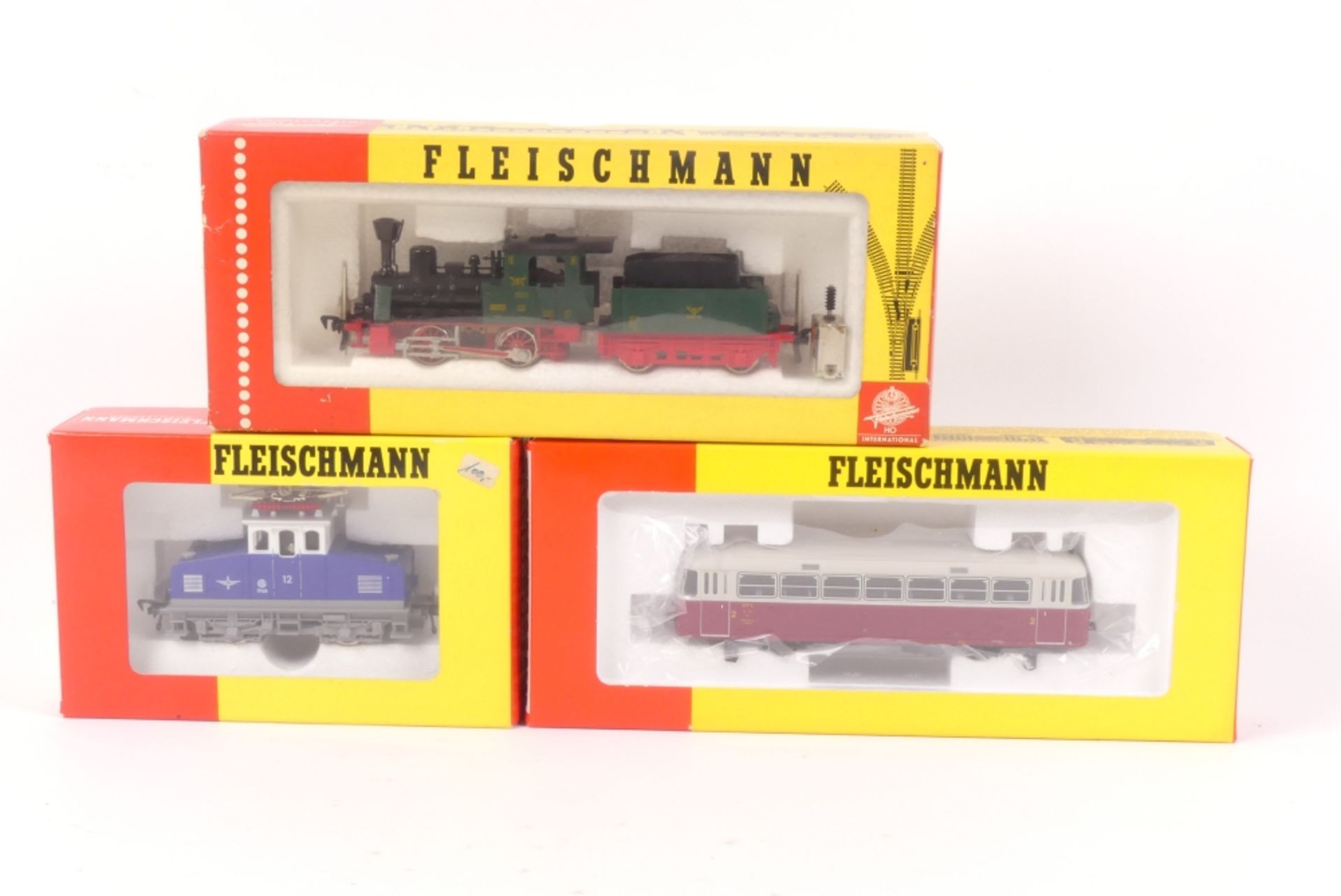 Drei Fleischmann TriebfahrzeugeDrei Fleischmann Triebfahrzeuge, 4305, E-Lok, 91 4405 L