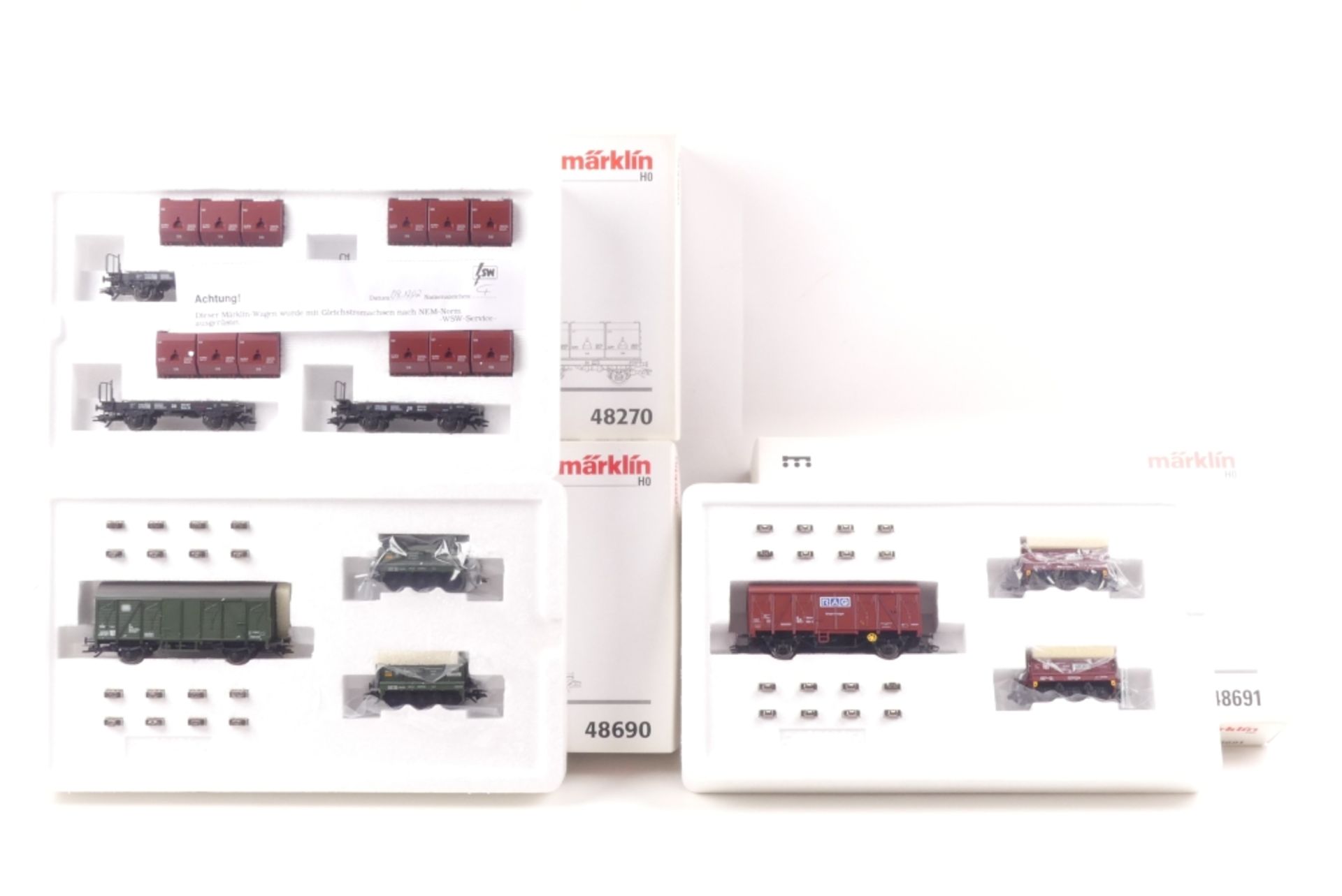 Märklin drei Wagen-SetsMärklin drei Wagen-Sets, 48691, 48690, mit Broschüre, 48270,