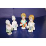 Four collectable ceramic half doll figures