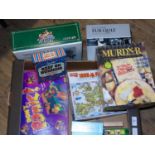 A box of assorted vintage games etc