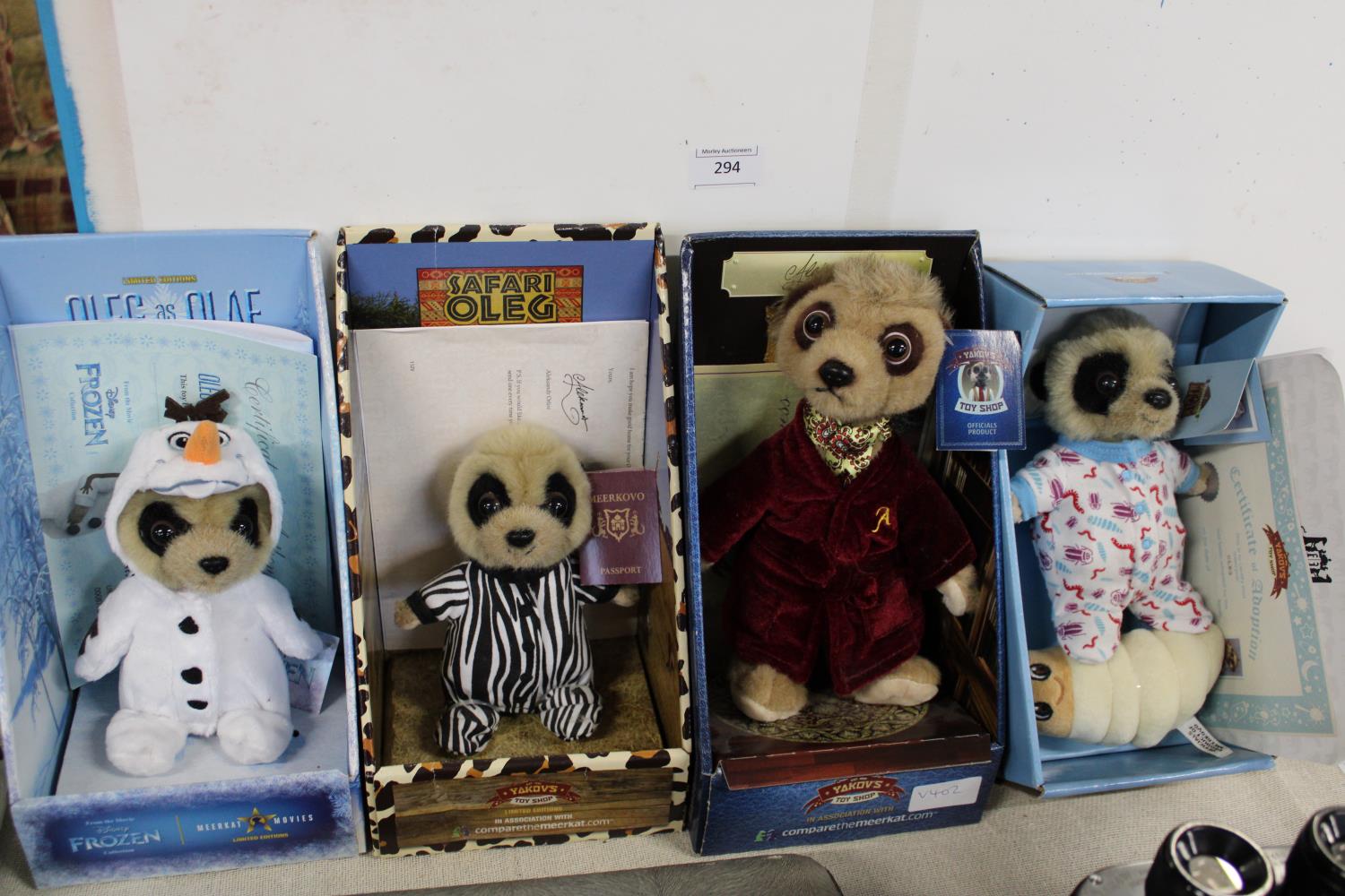 Four boxed as new collectable Meerkat toys