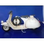 A boxed tin plate scooter model