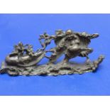 A small cast bronze Chinese figural group 14cm x 6cm