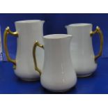 Three crown devon graduated jugs