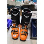 A pair of Tecnica mach 1 ski boots