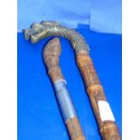 Two vintage handmade sword sticks