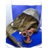 An original British WW2 babies gas mask/carrier dated 1939 and one other