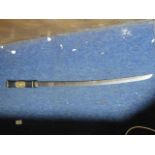 A Japanese style sword with an American etched blade