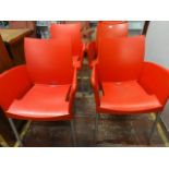 A set of four retro style stackable chairs