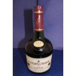 A vintage bottle of Martell cognac 24 fl.ozs