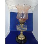 A quality brass based oil lamp with a Young's duplex burner H58cm