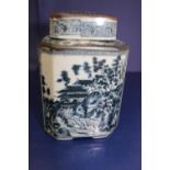 A Chinese porcelain tea cannister with landscape & village decoration