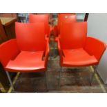 A set of four retro style stackable chairs