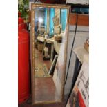 A large gilt framed dressing mirror 138x46cm