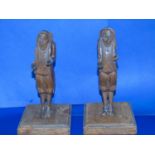 A pair of possibly Black Forest carved 'Dumb Waiters' on plinths. 24cm tall