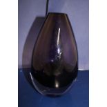 A purple art glass vase 20cm tall