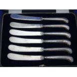 A cased set of six hallmarked for Birmingham 1901 silver handled butter knives