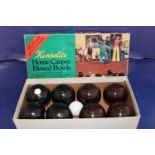 A vintage boxed set of carpet bowls