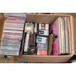 A box of LP's, CD's and cassettes tapes etc