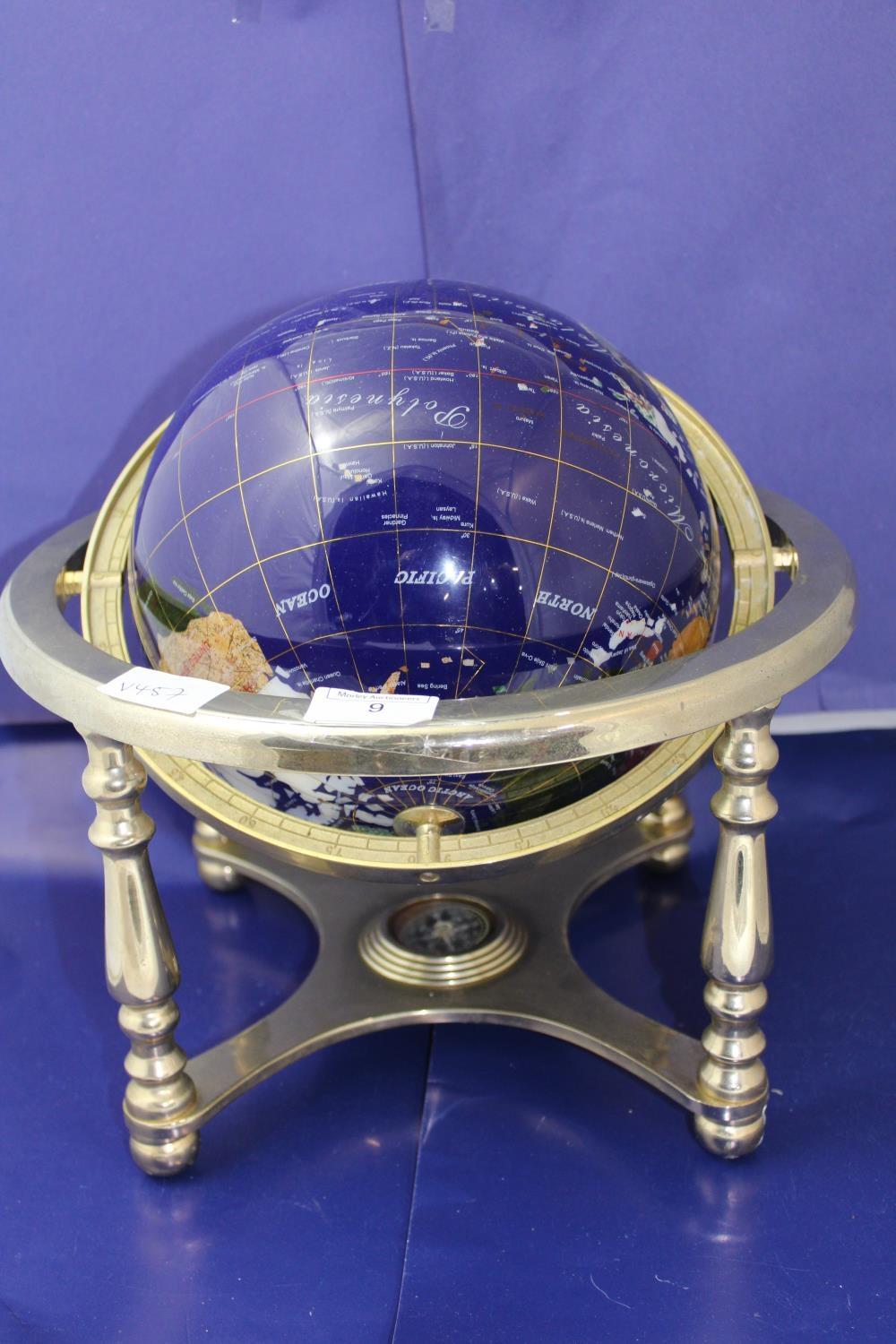 A semi precious stone World globe on a gimbal & stand, base Dia 32cm