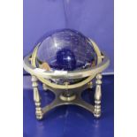 A semi precious stone World globe on a gimbal & stand, base Dia 32cm