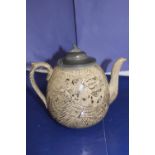 A collectable pewter lidded tea pot