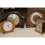 Four assorted vintage clocks, as found