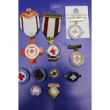 A job lot of vintage British Red Cross medals & badges