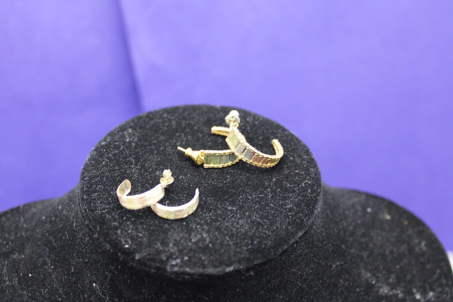 Two pairs of 9ct gold earrings 4.3 grams total