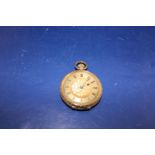 A vintage Ladies 18ct gold open faced pocket watch in working order. 43.9 grams total weight