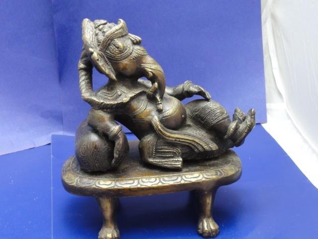 A large reclining Ganesha bronze study H26cm W20cm