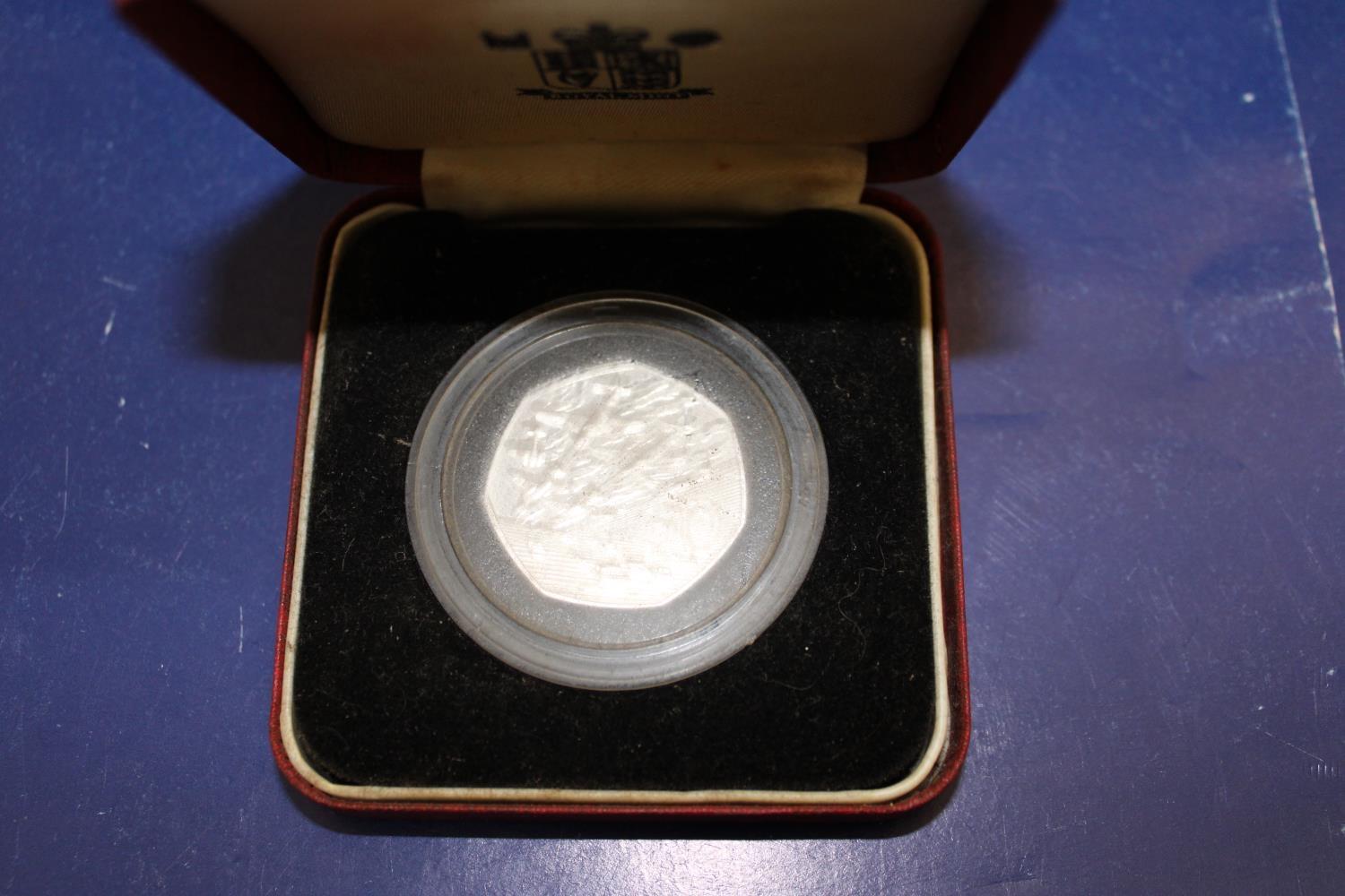 A 1994 silver proof fifty pence piece