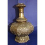 An antique Middle Eastern hooker base bronze with high relief bird decoration h28cm
