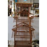 A vintage Chinese wooden bird cage unable to post approx 73x38cm