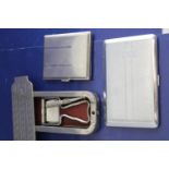 A vintage Rolls razor & two silver plated cigarette cases